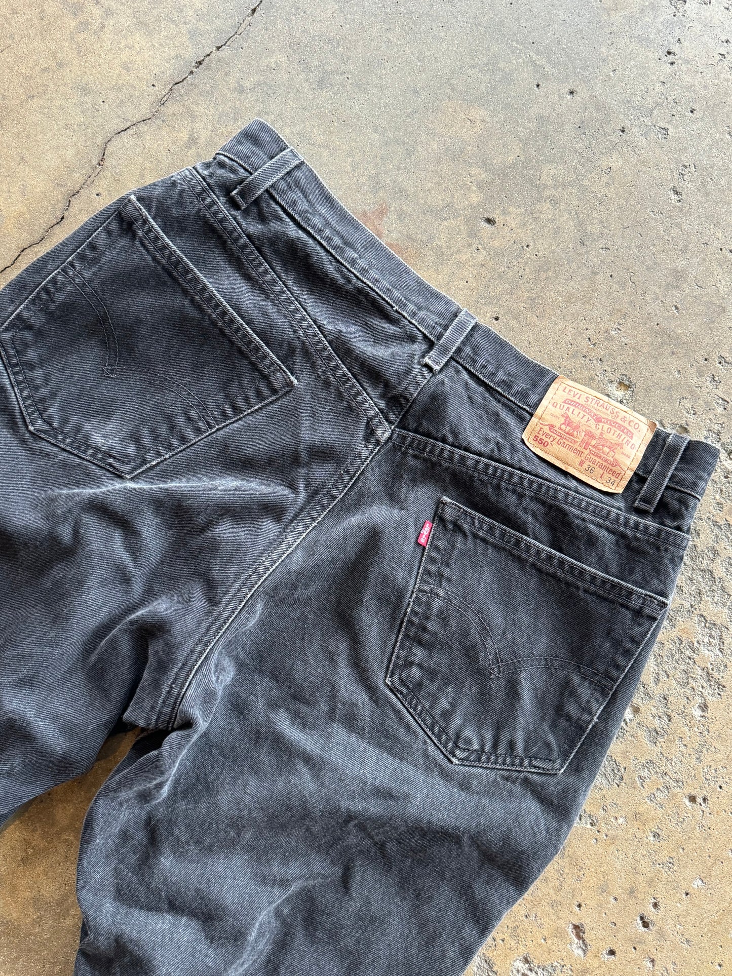 36 - Vintage Faded Black Levi 550 Jeans