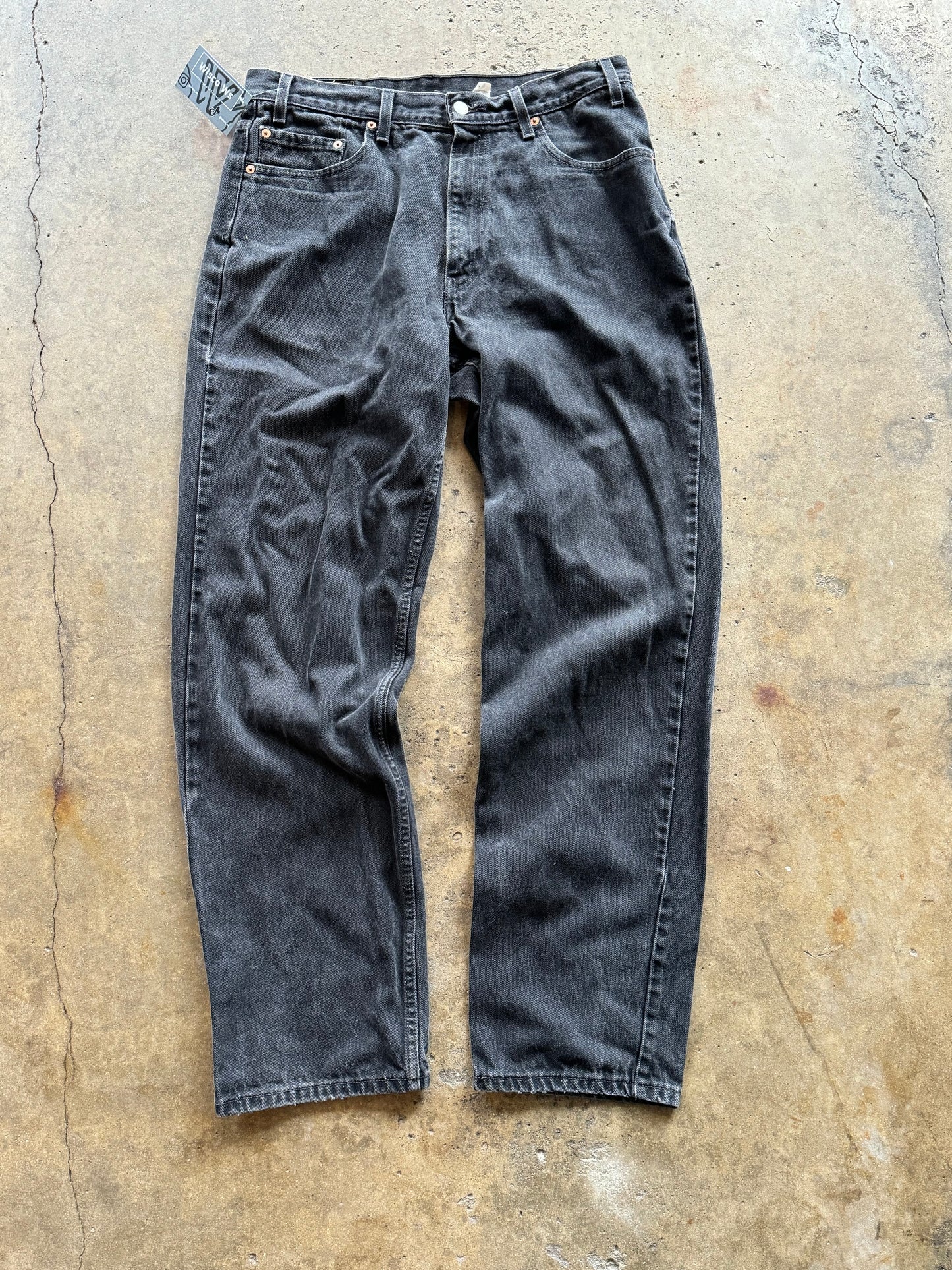 36 - Vintage Faded Black Levi 550 Jeans