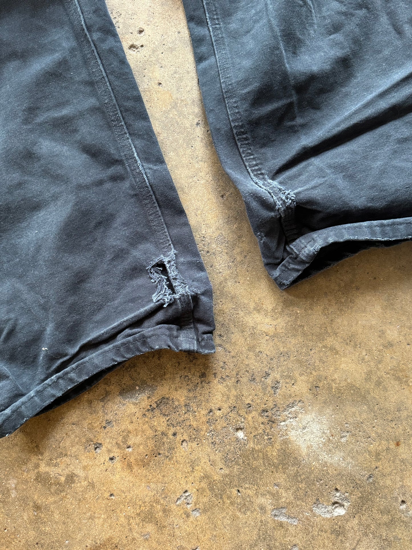 34 - Faded and Trashed Black Carhartt Carpenter Pants