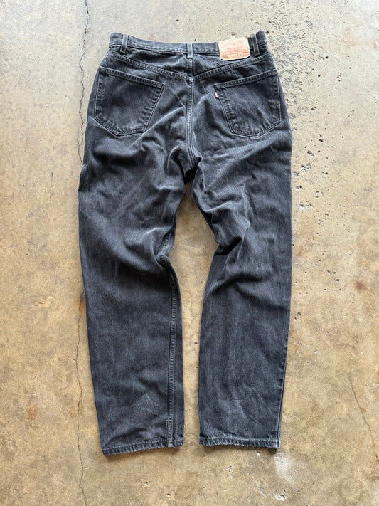 36 - Vintage Faded Black Levi 550 Jeans