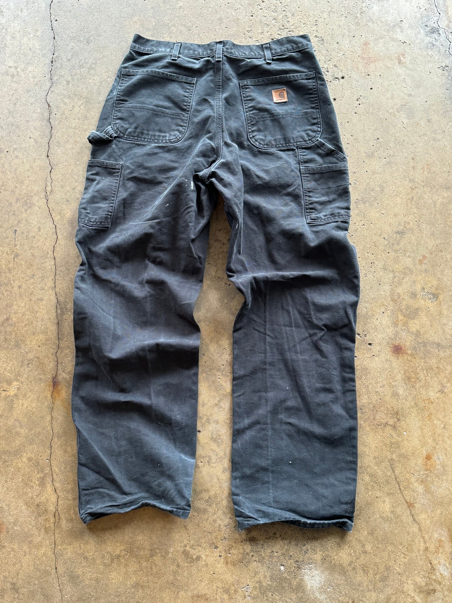 34 - Faded and Trashed Black Carhartt Carpenter Pants